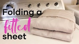 Folding A Fitted Sheet  How To Fold Sheets [upl. by Ntsyrk161]